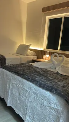 Uma cama ou camas num quarto em Del Mar SG Apartment