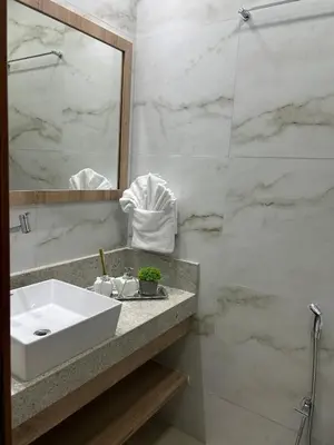 Uma casa de banho em Del Mar SG Apartment