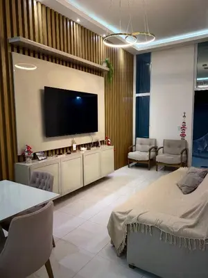 Uma televisão e/ou sistema de entretenimento em Casa em Fortaleza