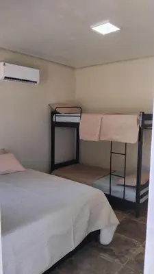 Uma cama ou camas num quarto em Casa na lagoa do Paraíso- Villa Bem Estar