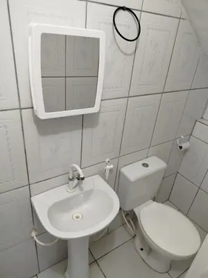Uma casa de banho em Tô em Casa Hospedagem
