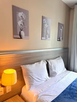 Uma cama ou camas num quarto em VGFUN 233-60m2-2 quartos2wcs-VistaMar-Pé na Areia