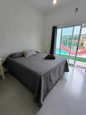 Uma cama ou camas num quarto em KaBeat House Icaraizinho