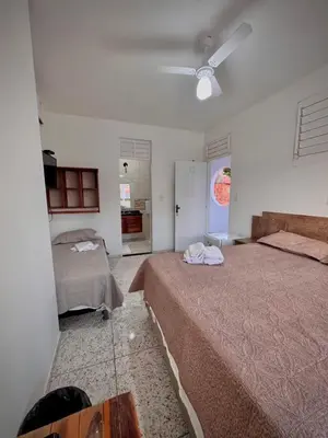Uma cama ou camas num quarto em Pousada Kalango Flecheiras