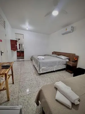 Uma cama ou camas num quarto em Pousada Kalango Flecheiras