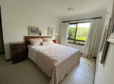 Uma cama ou camas num quarto em Condomínio Monteflor Guaramiranga