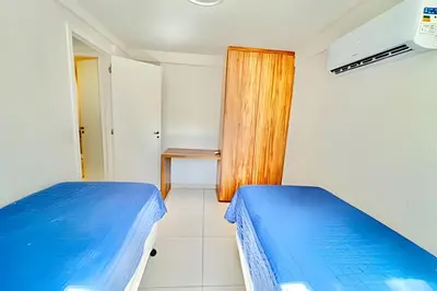 Uma cama ou camas num quarto em Vista Mar em Aquiraz Riviera - Beach Place por Casamarinn