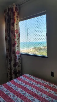 Uma cama ou camas num quarto em Apartamento 02 quartos Praia do Futuro