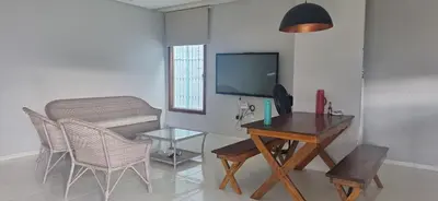 Uma televisão e/ou sistema de entretenimento em Casa praia Paracuru