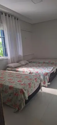 Uma cama ou camas num quarto em Casa praia Paracuru