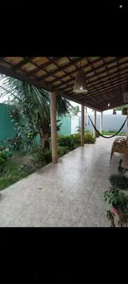 Um jardim no exterior de Casa praia preá