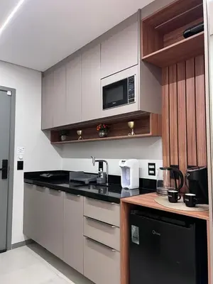 A cozinha ou kitchenette de Studio Pérola com Rooftop Vista para o Mar