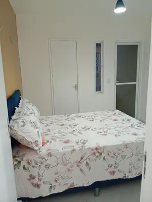 Uma cama ou camas num quarto em Casa duplex em Maracanaú com ar-condicionado