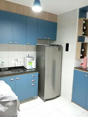 A cozinha ou kitchenette de Casa duplex em Maracanaú com ar-condicionado