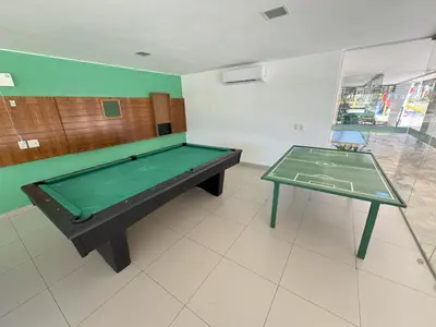 A sala de jogos em Apto nascente completo no Riviera Beach Place l 3 suítes