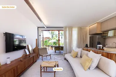 Uma televisão e/ou sistema de entretenimento em Casa com Piscina no Origem Fortim