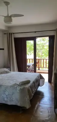 Uma cama ou camas num quarto em Brisa Cumbuco - Apê na Praia