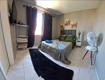 Uma cama ou camas num quarto em Apartamento em cond na Praia do Futuro com 2 suítes