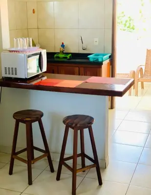 A cozinha ou kitchenette de Pousada Triplex Pôr Do Sol