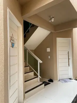 Uma cama ou camas num quarto em Apartamento novo 01