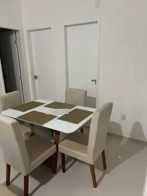 Uma área de estar em Apartamento novo 01