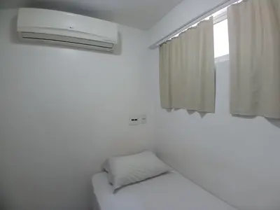 Uma cama ou camas num quarto em Beach Class Fortaleza