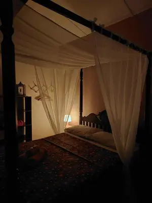 Uma cama ou camas num quarto em Manga Rosa Hospedagem