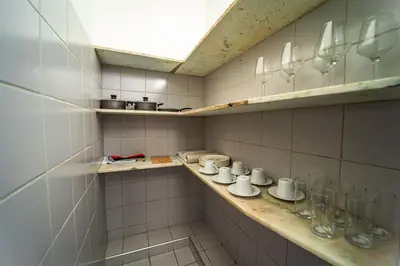 A cozinha ou kitchenette de Apartamento a 1 quadra da praia