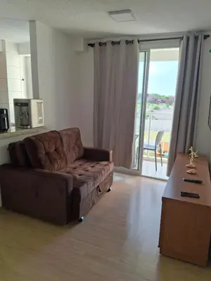Uma área de estar em Ap 2 quartos ,condomínio mirante clube