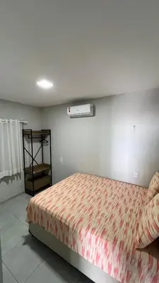 Uma cama ou camas num quarto em Casa do Airton