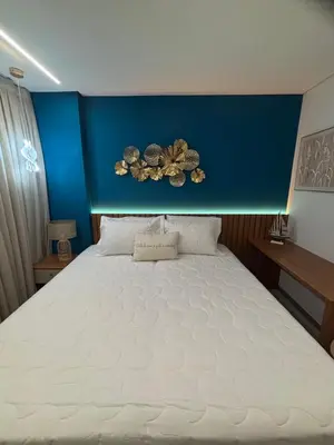 Uma cama ou camas num quarto em Beach Class Meireles