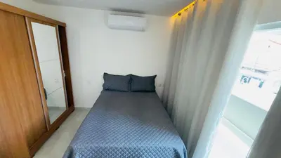 Uma cama ou camas num quarto em Apartamento Praia de Iracema 1