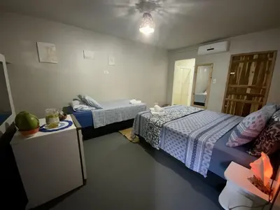 Uma cama ou camas num quarto em Vila Goa Beira Mar - Prea