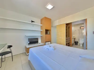 Uma televisão e/ou sistema de entretenimento em Flats Tabajara Residence