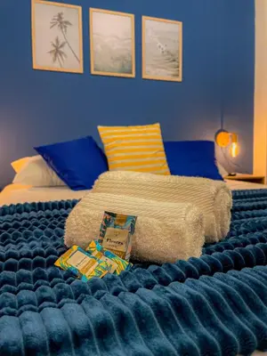 Uma cama ou camas num quarto em Studio Beira-mar, rooftop com piscina e jacuzzi