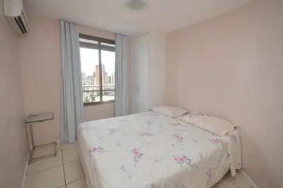 Uma cama ou camas num quarto em Leme Penthouse Apartment
