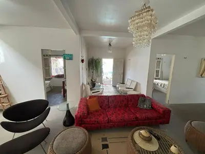 Uma área de estar em Casa de Praia na Taiba