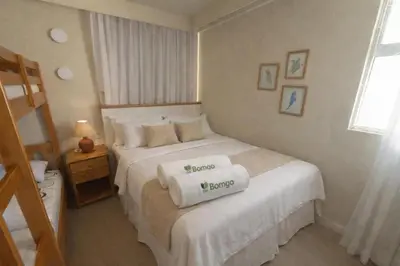 Uma cama ou camas num quarto em PortaMaris - excepcional, Pé na área, vizinho ao BP
