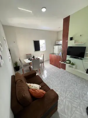 Uma televisão e/ou sistema de entretenimento em Apartamento em Fortaleza