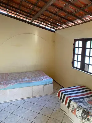 Uma cama ou camas num quarto em Casa Branca