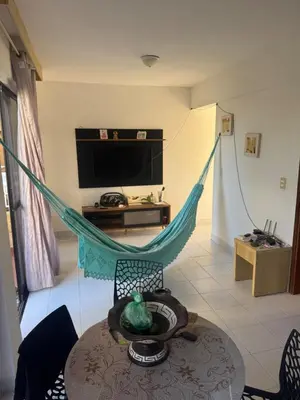 Uma área de estar em Apartamento 2 quartos Condomínio Vila Dunas