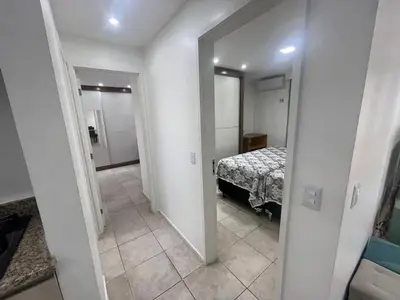 Uma cama ou camas num quarto em Flat Acolhedor e Familiar
