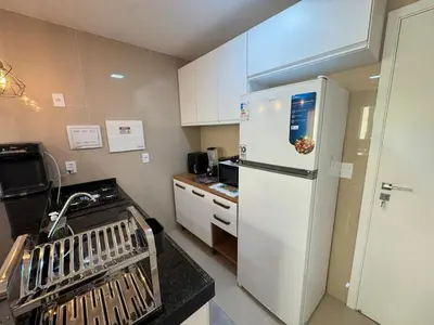A cozinha ou kitchenette de Ap próx ao Shopping com garagem, piscina e ar