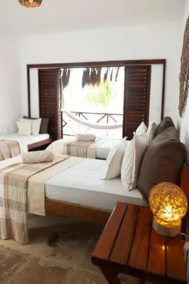 Uma cama ou camas num quarto em Kitenest