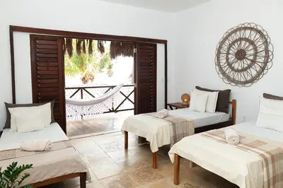 Uma cama ou camas num quarto em Kitenest