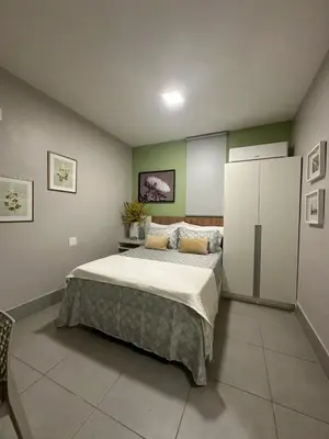 Uma cama ou camas num quarto em Benfica Apart Hotel
