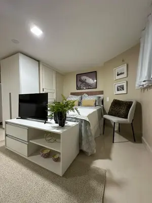 Uma televisão e/ou sistema de entretenimento em Benfica Apart Hotel