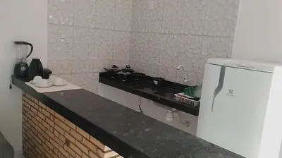 A cozinha ou kitchenette de Pousada Residencial Manzuá