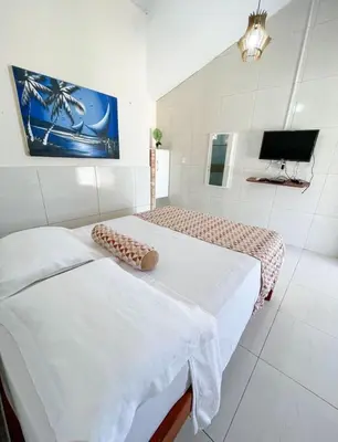 Uma cama ou camas num quarto em Pousada o Èdio