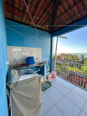 Uma varanda ou terraço em Casa vista mar, perfeita para família e amigos